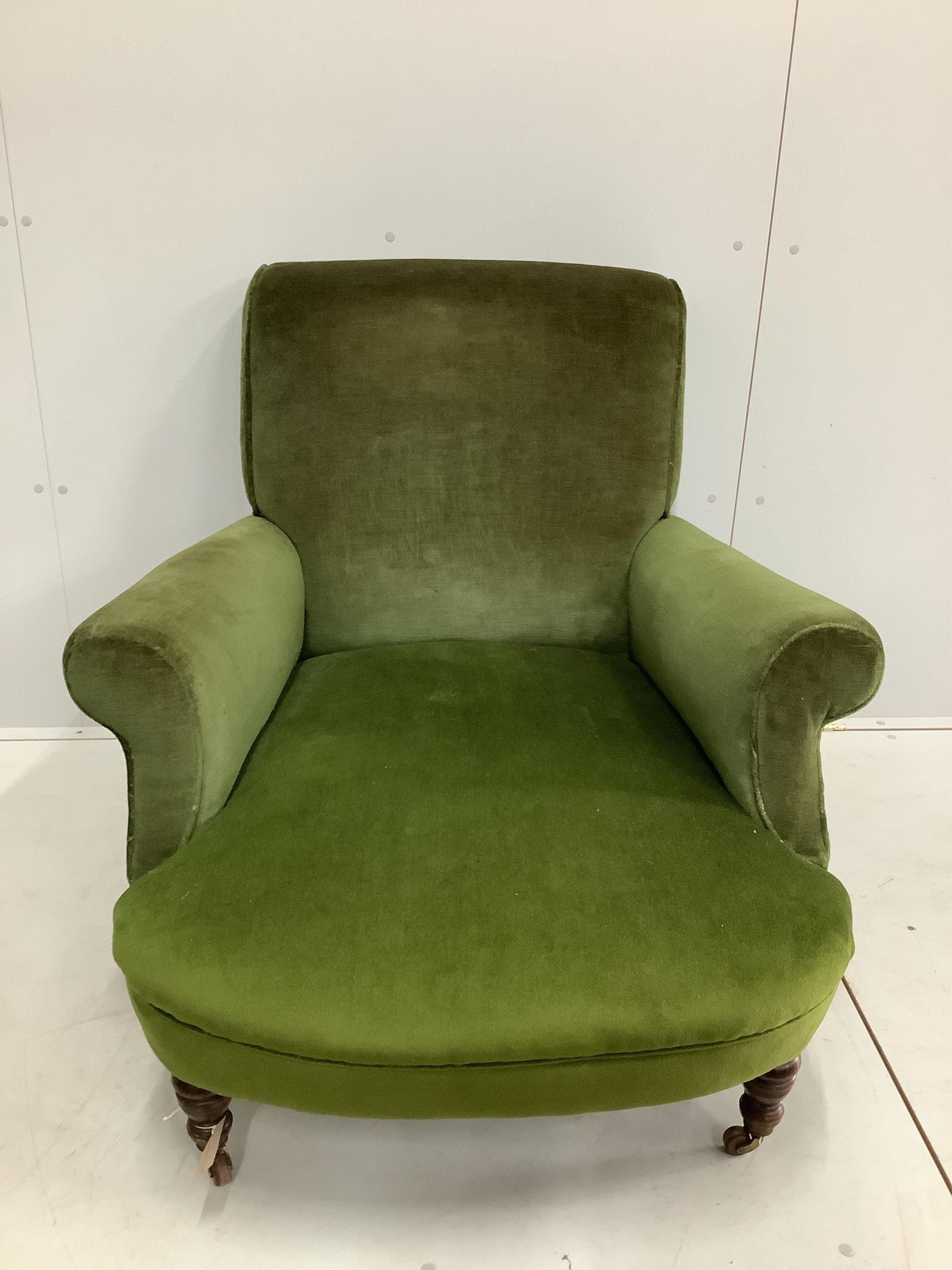 A Victorian Howard style upholstered armchair, width 90cm, depth 106cm, height 84cm